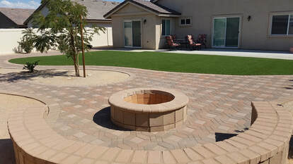 Fire pit, interlocking pavers and artificial grass