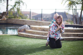 Mom and Son play on NextLawn artificial grass in The Woodlands, Texas
